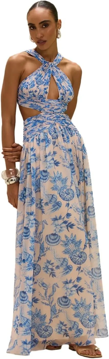 Printed halter maxi for destination dinners and terraces.
Fluid movement for warm coastal nights.
