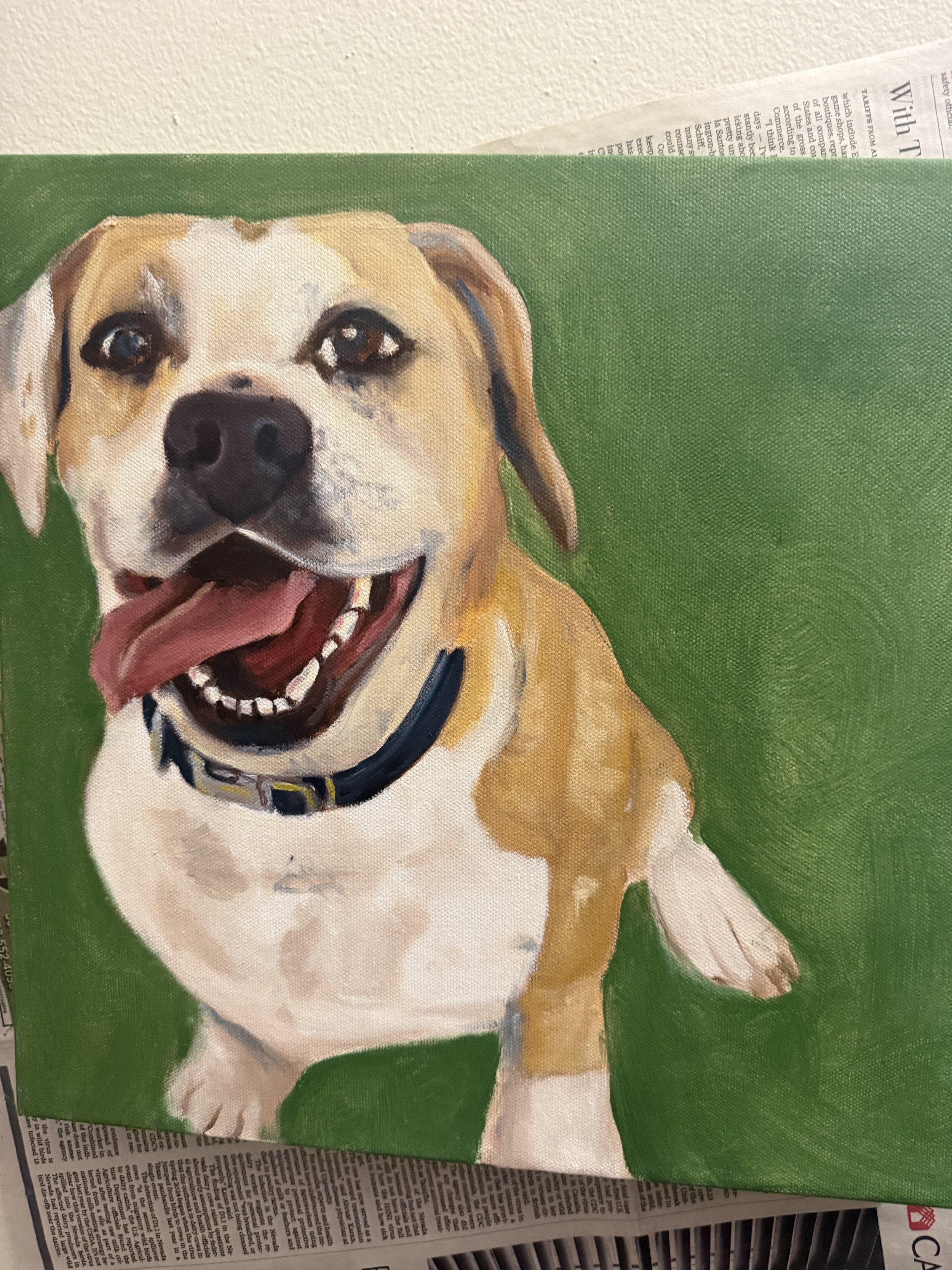 Painting of a happy dog with a tan and white coat, black collar, open mouth, tongue out, set against a green background.