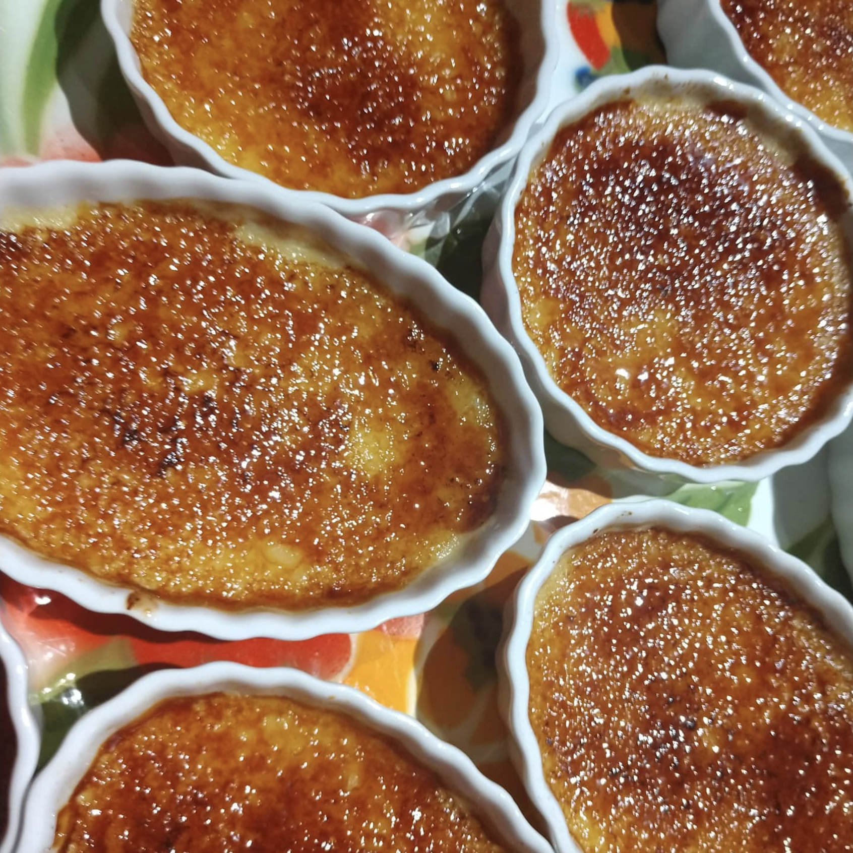 Oval dishes filled with creme brulee