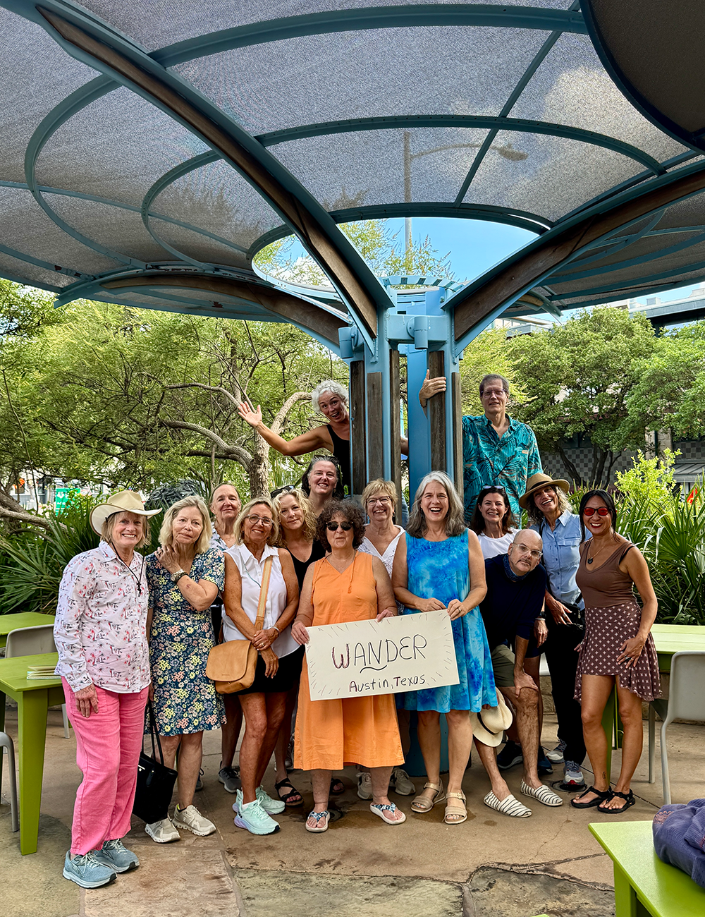Group of women, in Carolyn's group, posing for the camera after completing an event.