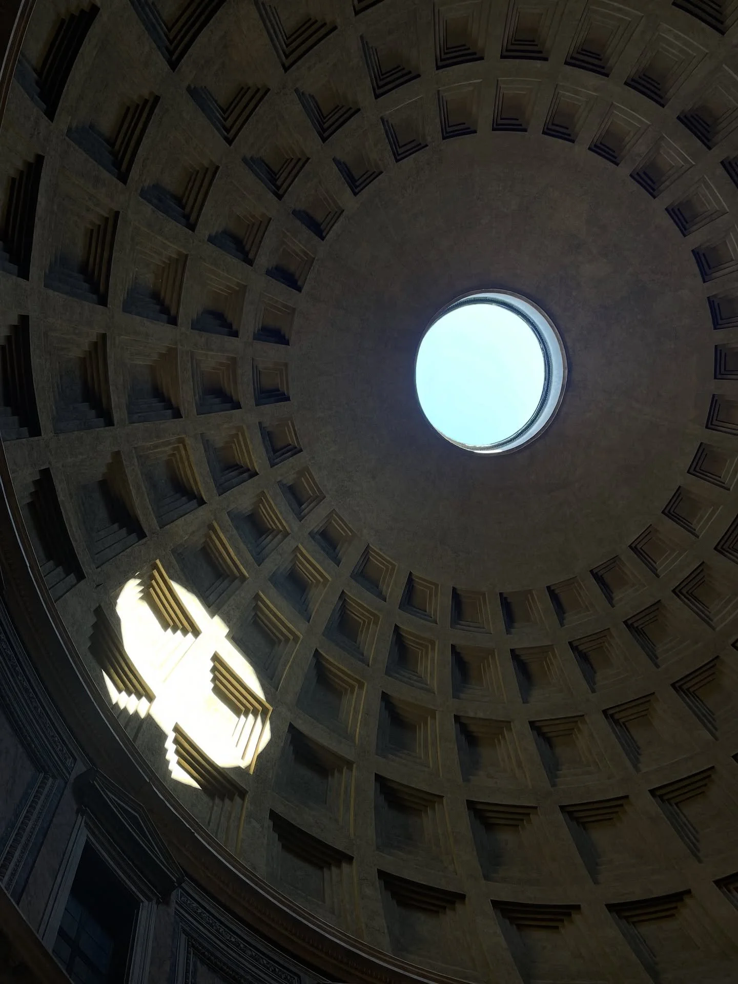 A picture that I took in my last year&rsquo;s class trip to Rome. We had studied a lot about the mystery and perfection of the Roman Pantheon. Seen as perfectly symmetrical with a functioning oculus in the center.  Dates back to the 2nd Century