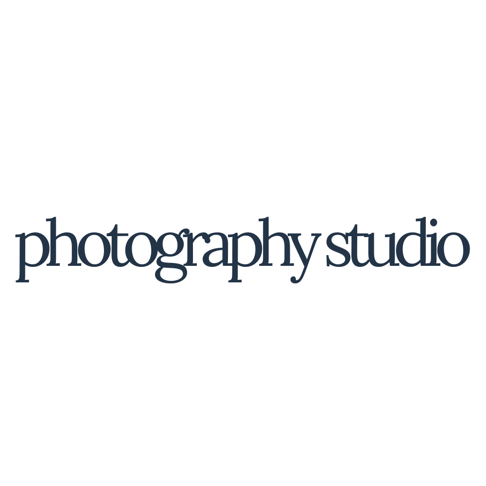 A black-and-white logo with a camera icon and the text 'photography studio' beneath it.