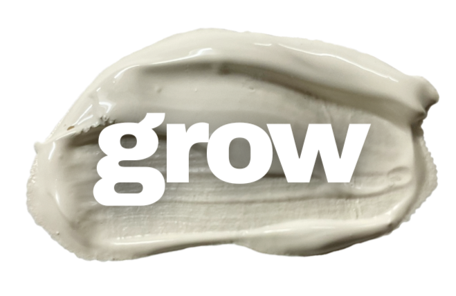 White cream with the word 'grow' in bold white letters.
