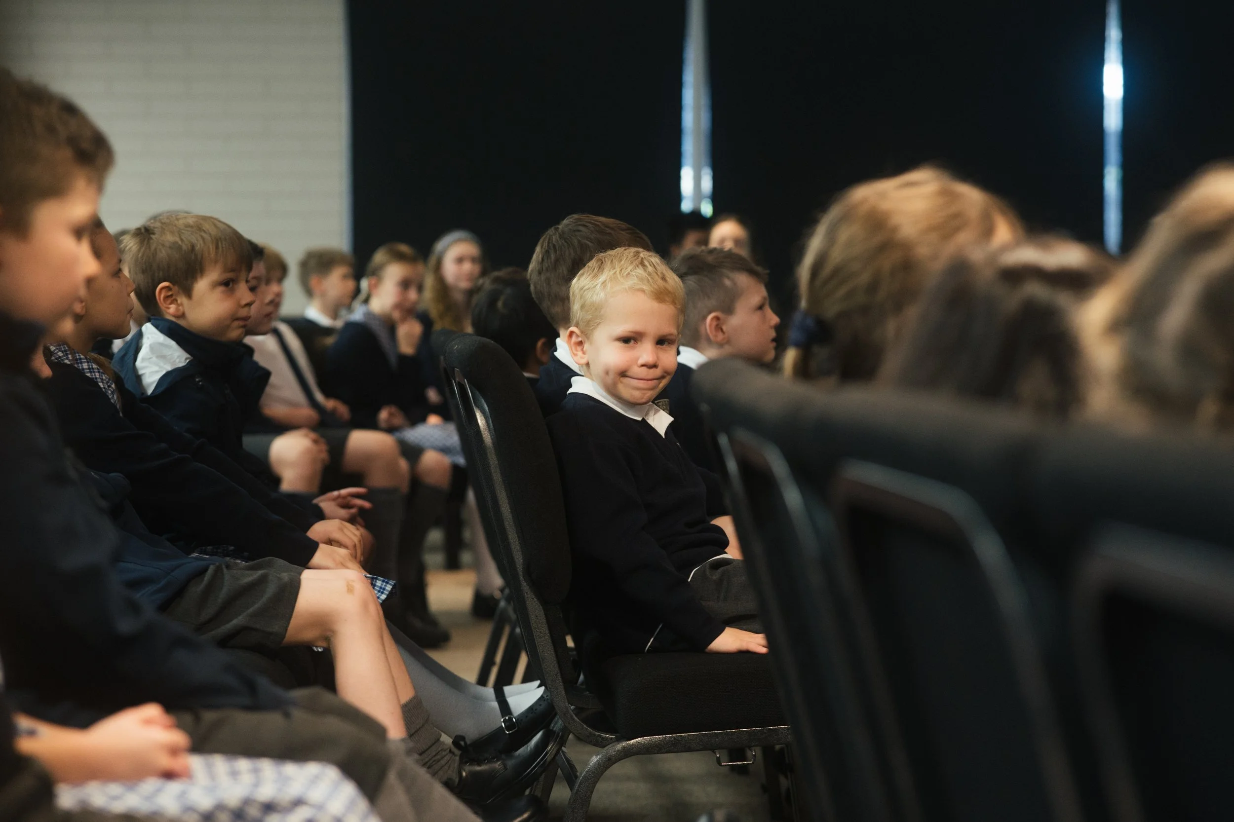Twin Oaks Classical School school community gathered in auditorium
