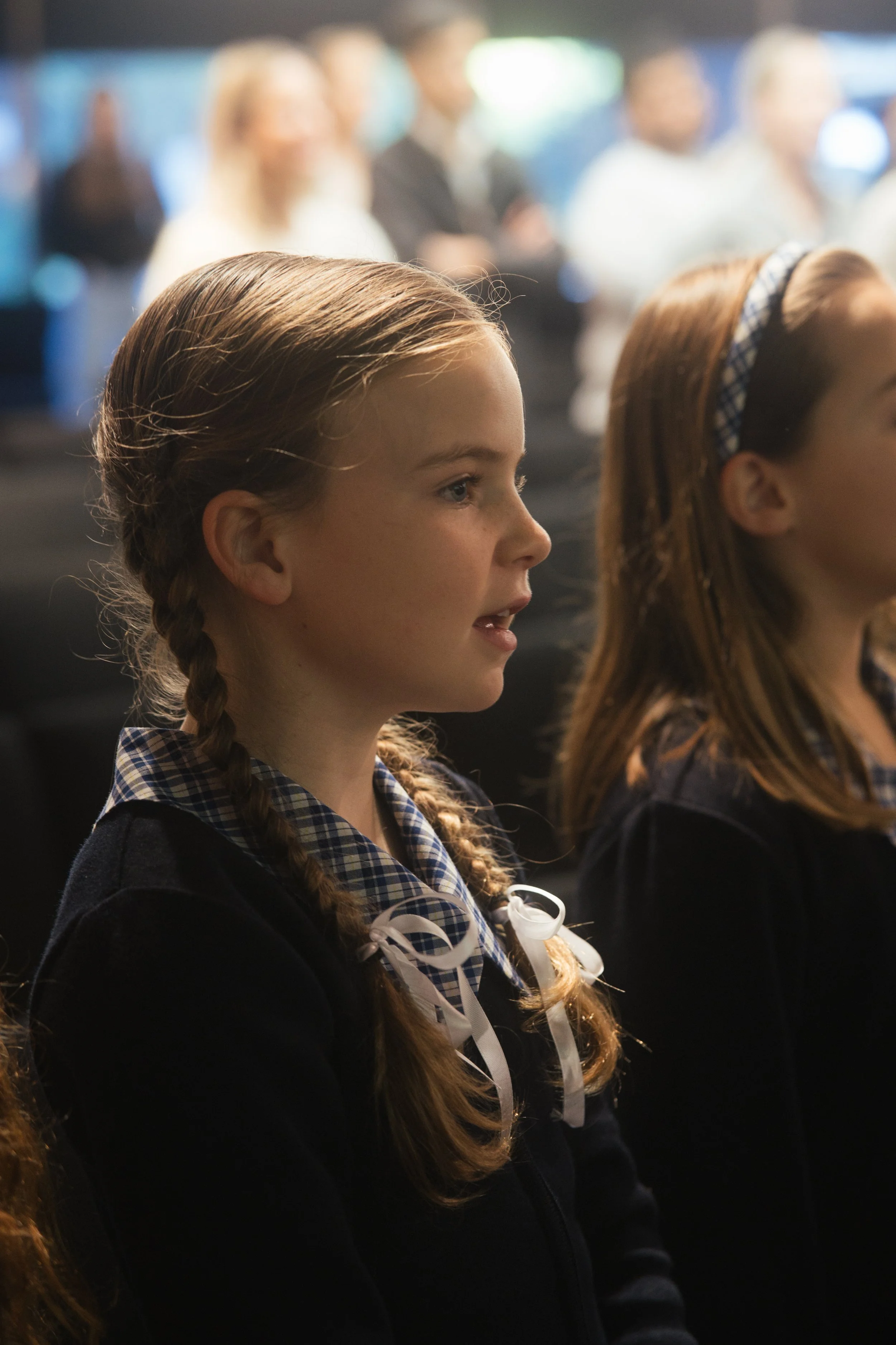Twin Oaks Classical School student singing at assembly
