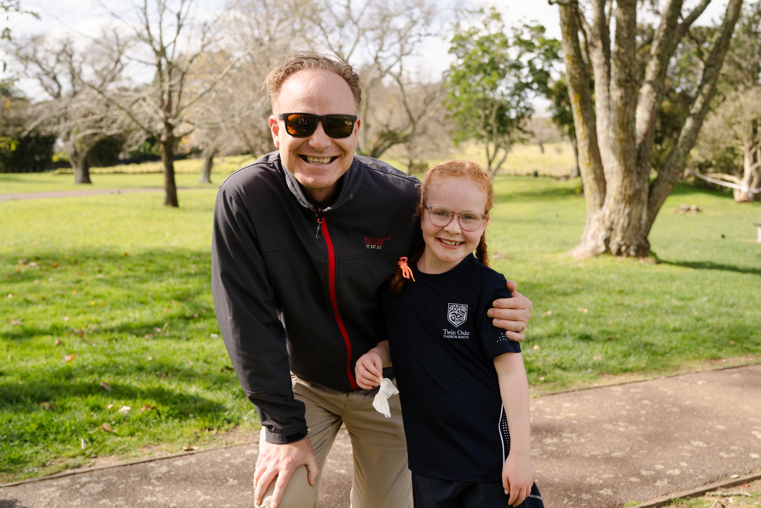 Twin Oaks Classical School father and daughter participating in community day