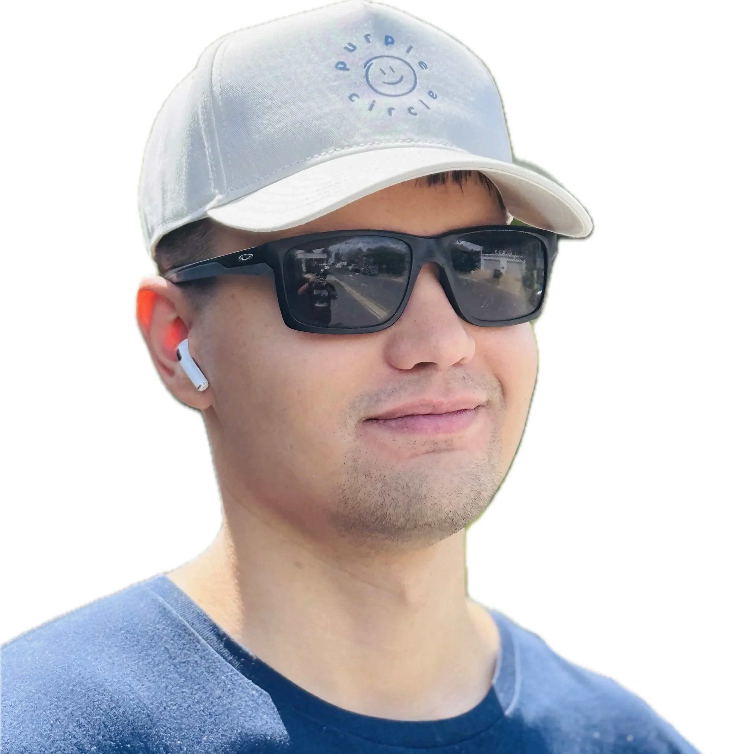 Zac wearing a Purple Circle cap. Epilepsy awareness brand