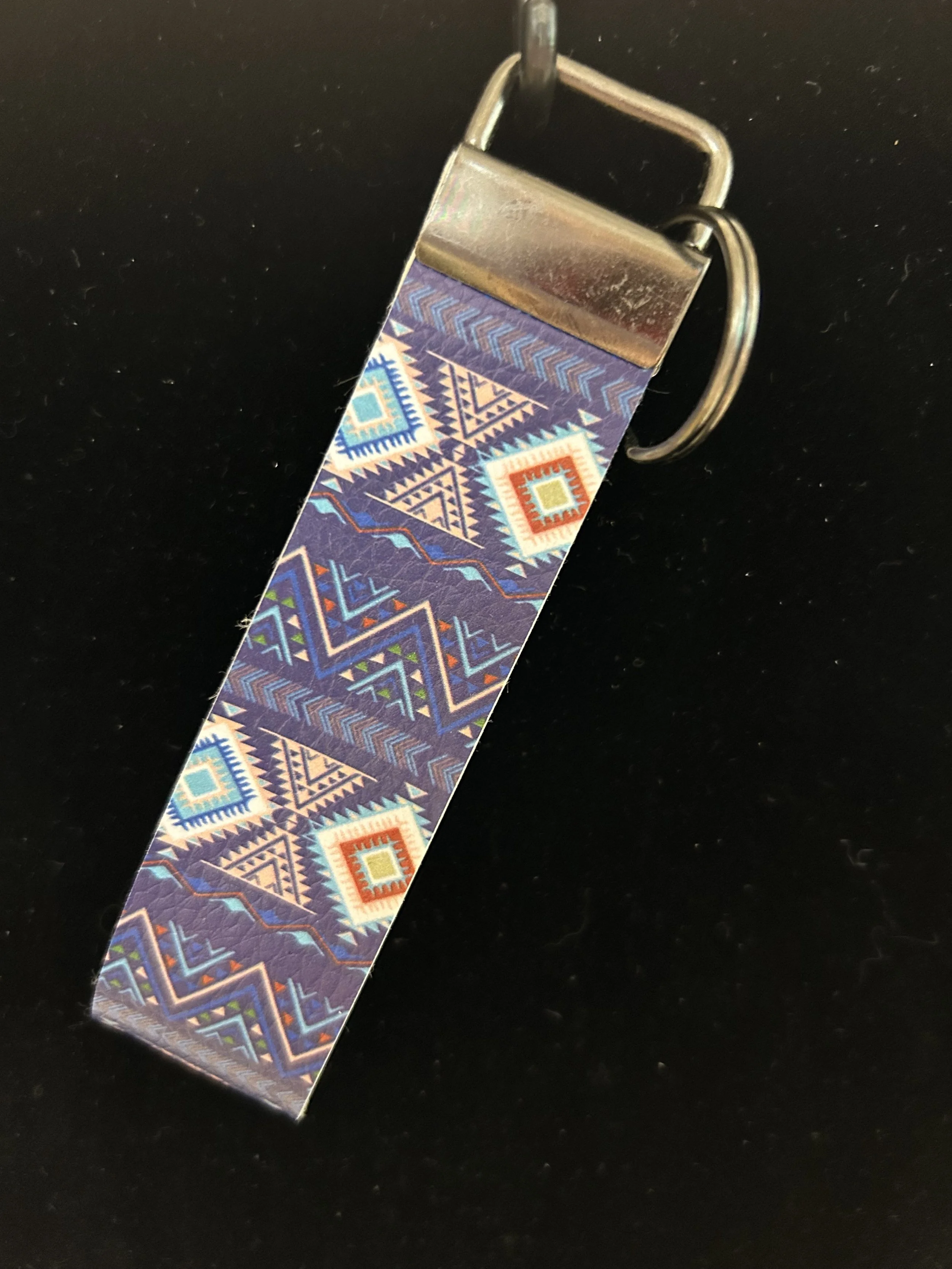 Indian print blue handheld