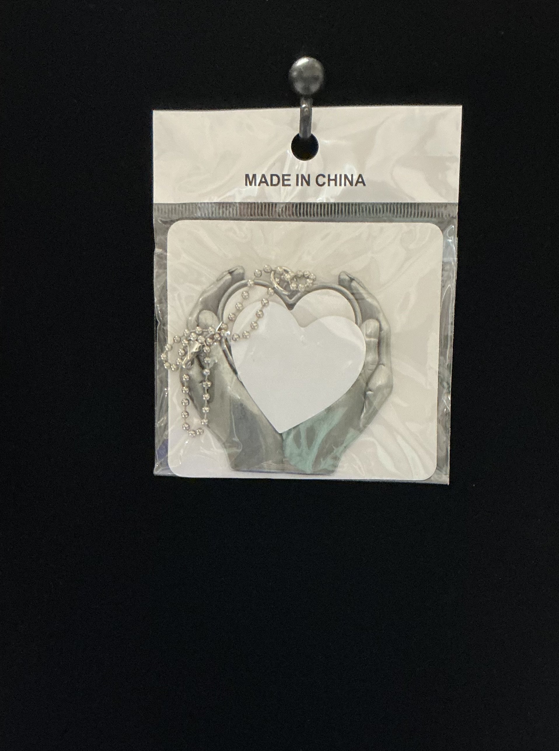 Cupped hands pendant