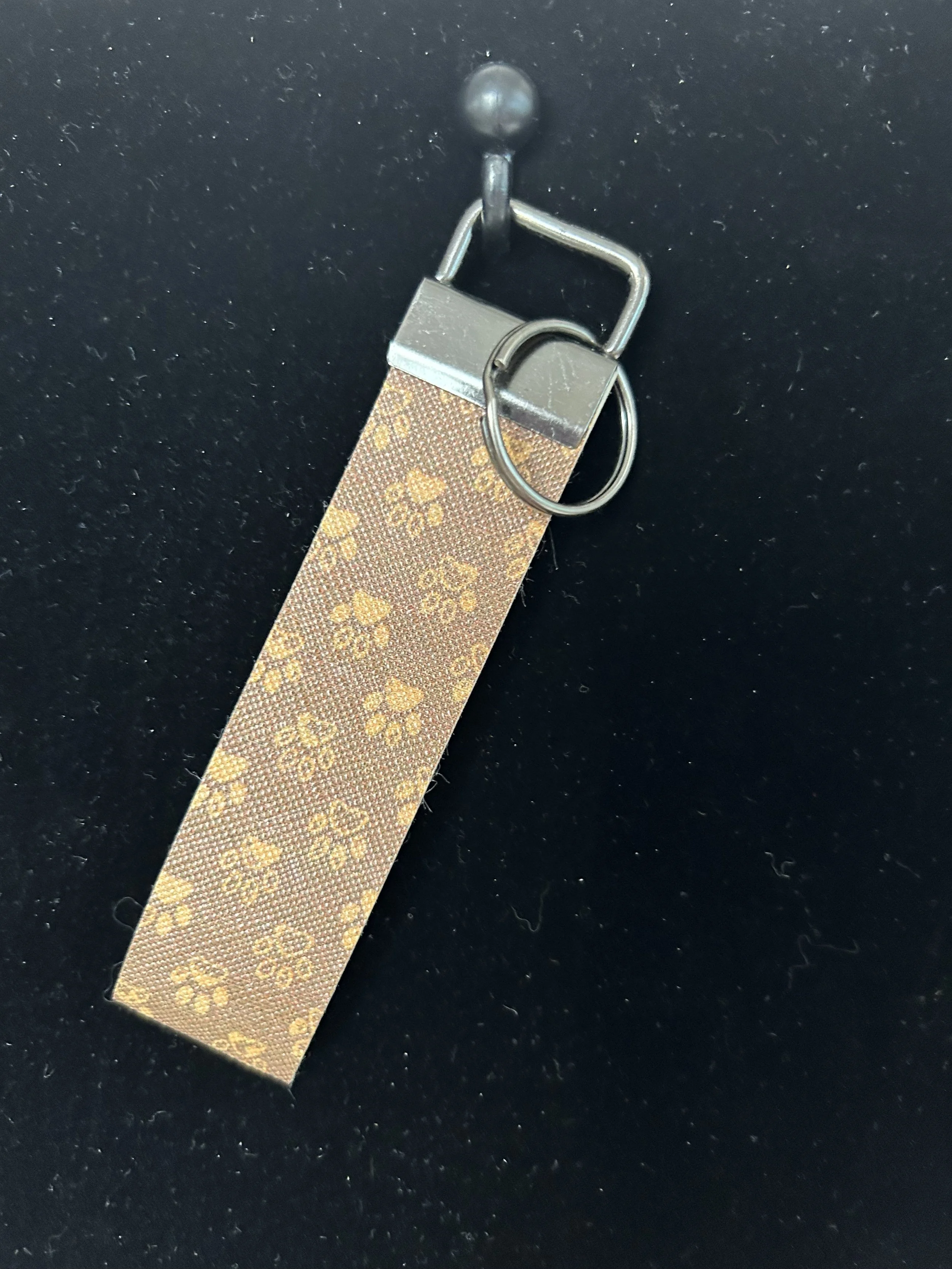 Puppy paw brown handheld