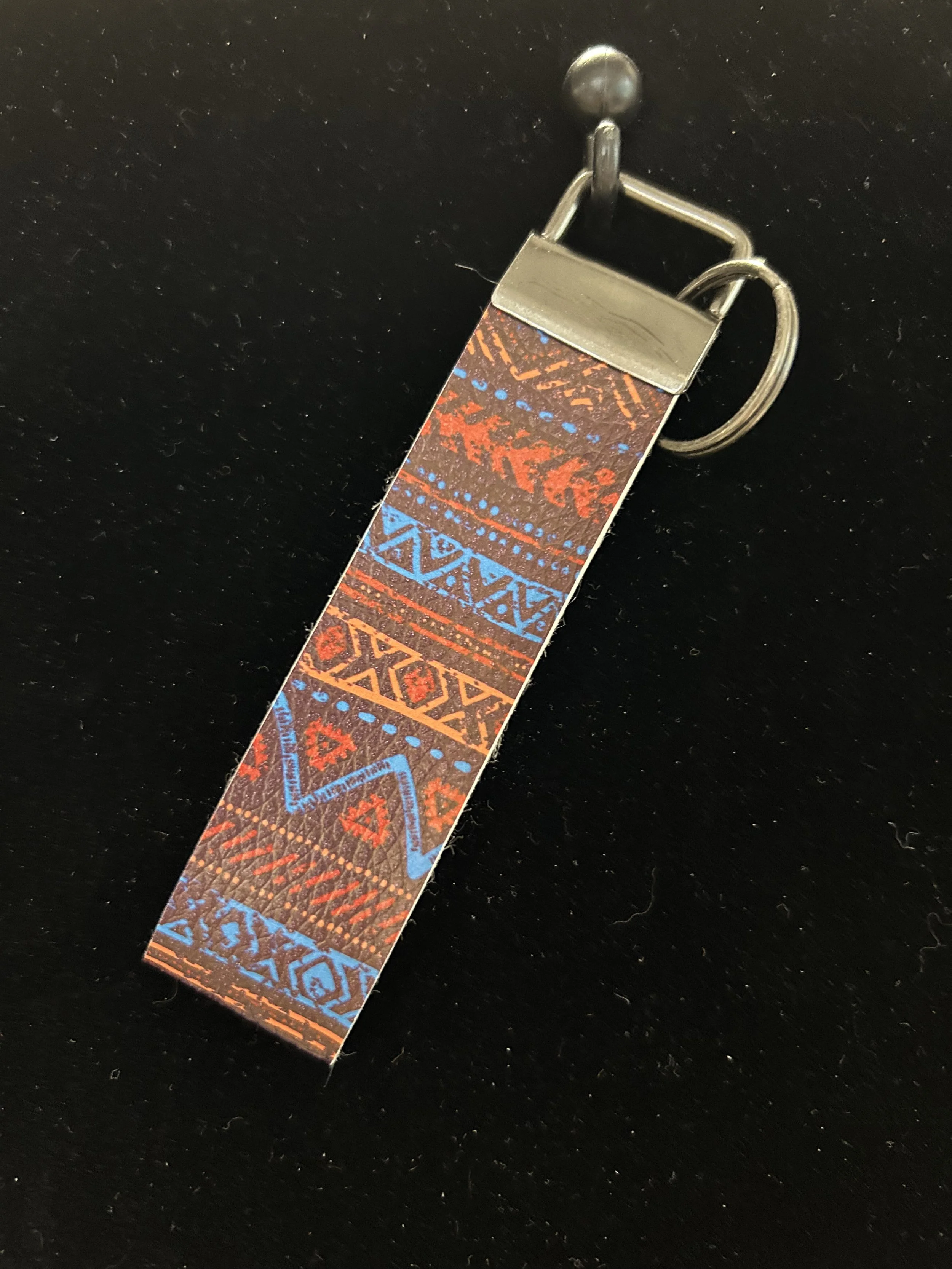 Indian print blue handheld