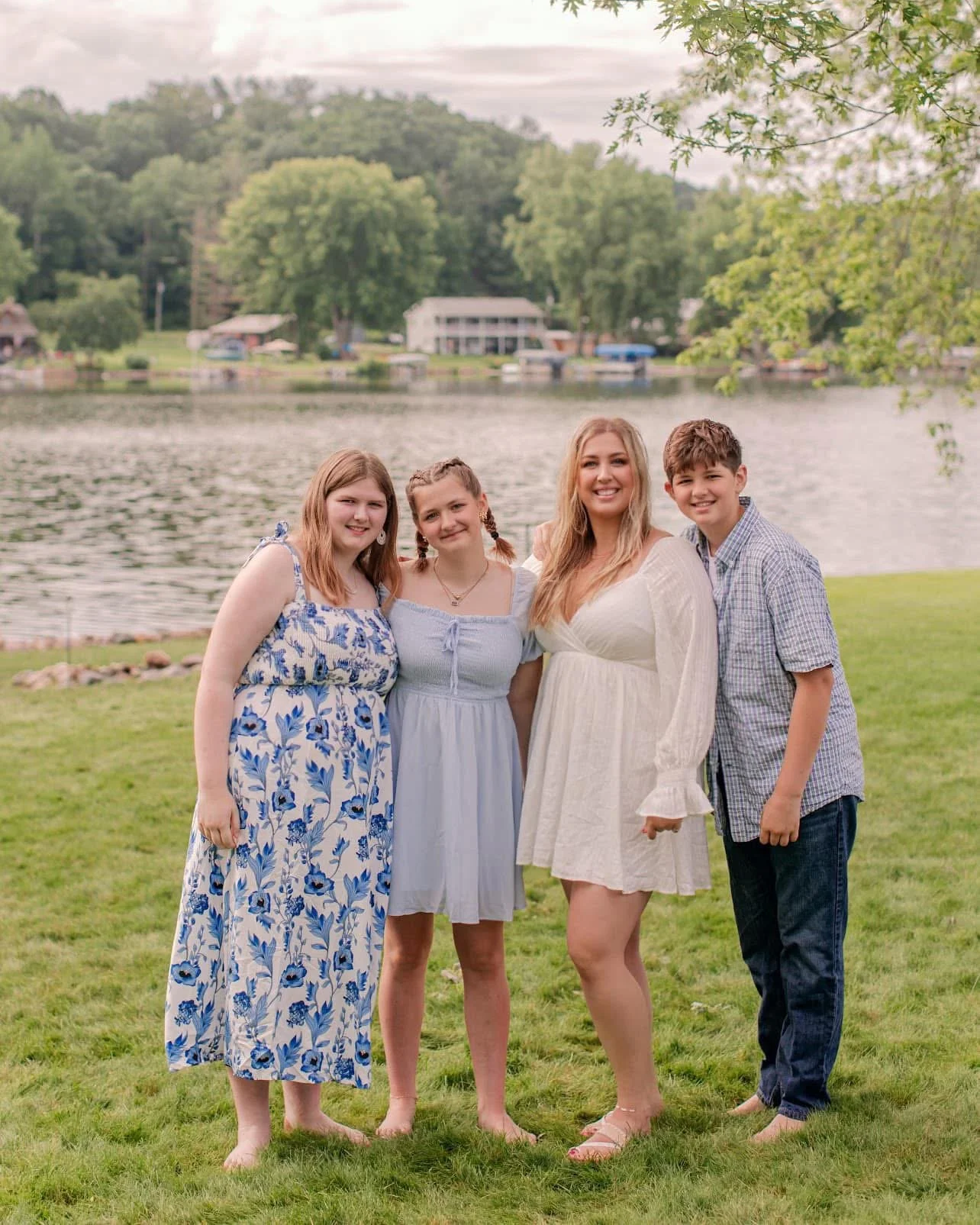 Victoria LaBrosse standing with her brother and sisters