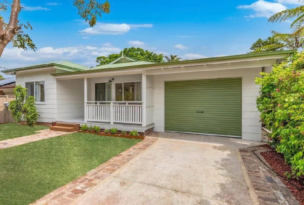 New balcony and garage to update this original cottage