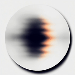 Blurred circular object with varying shades of black, white, and beige