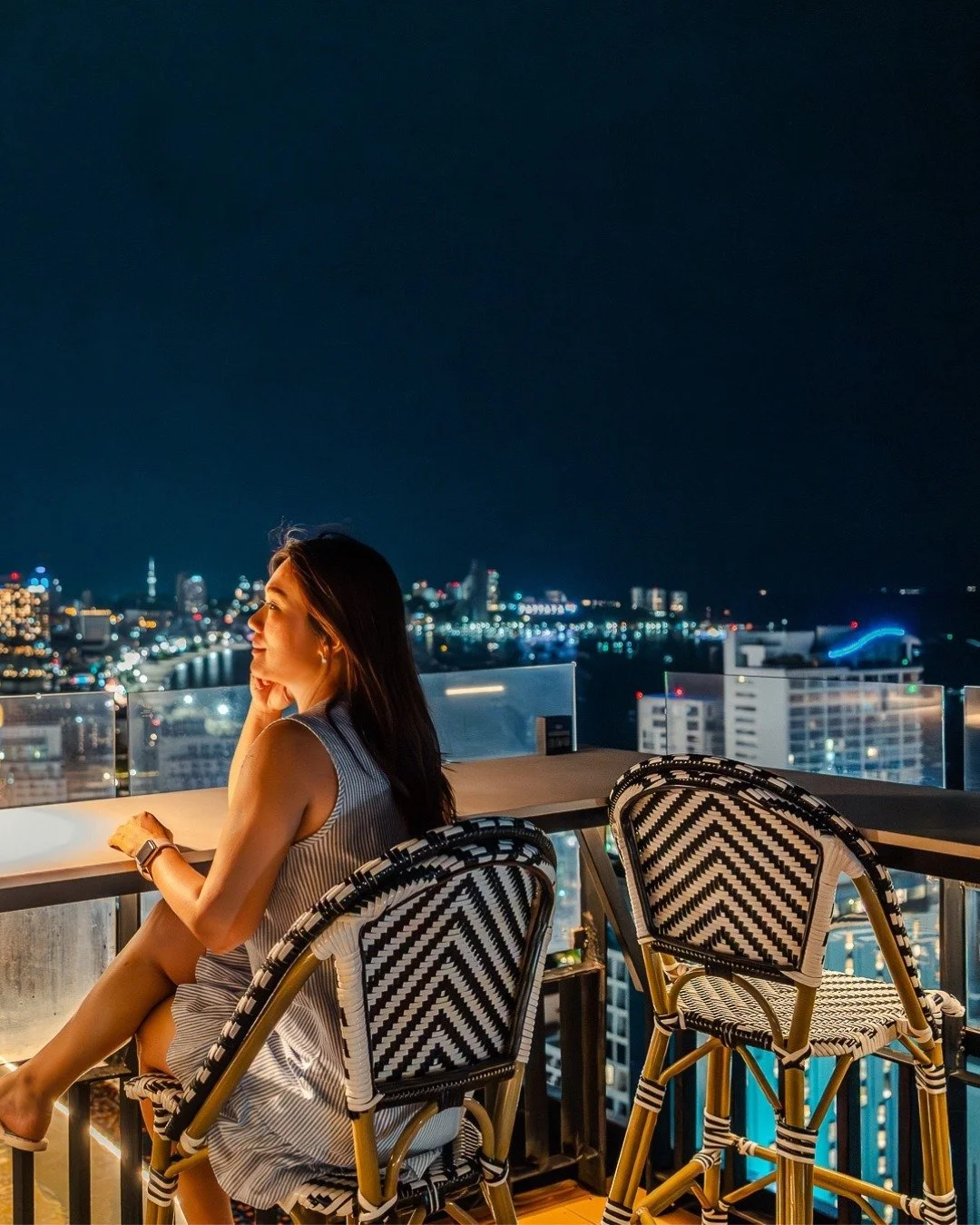 Perched on a high chair, city lights twinkling below, and a gentle rooftop breeze in her hair, this is what happiness looks like at Skybar Summer Club. Sipping, smiling, and soaking in the skyline, every night feels like magic.

#SkybarSummerClub #Sk