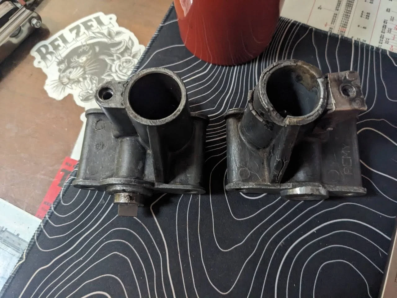 1927 Maxwell distributor housing reference part and Crumbling original 1928 Chrysler distributor housing
