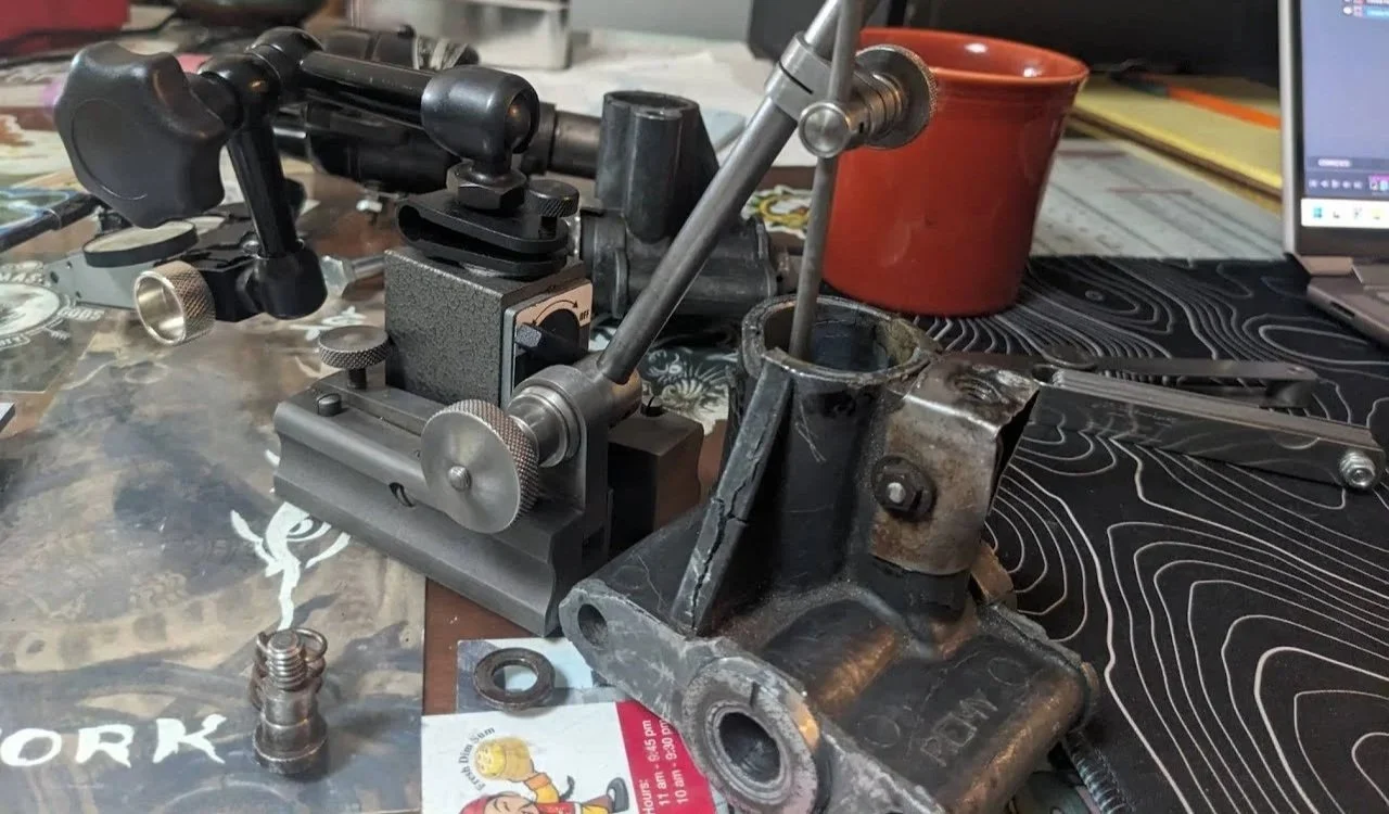 Crumbling original 1928 Chrysler distributor housing showing zinc pest rot