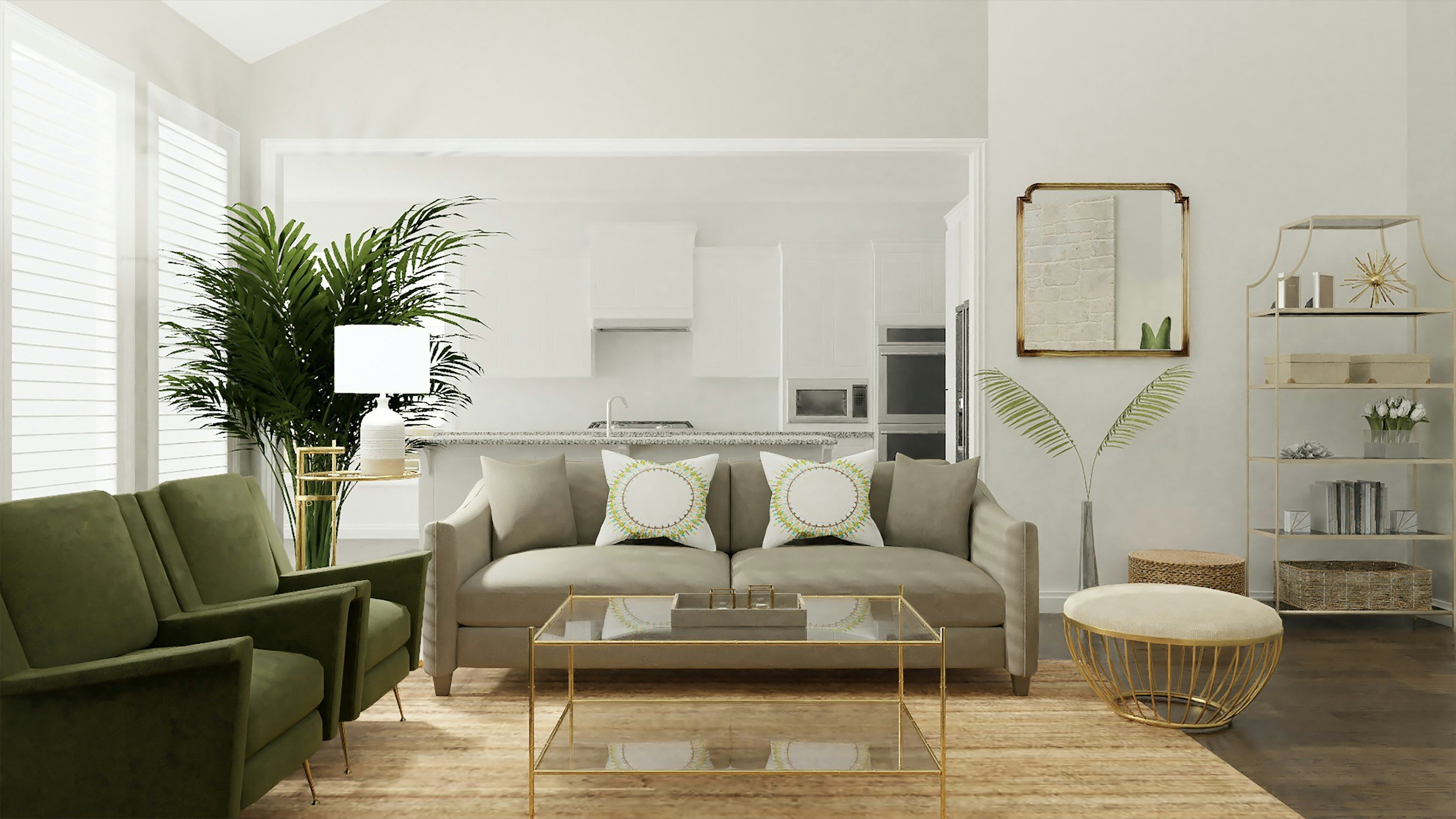 Living room with beige sofa, green armchairs, a glass coffee table with gold frame, large houseplant, white lamp, round woven ottoman, and white shelving unit with decorative items, with a view into the bright kitchen with white cabinets.