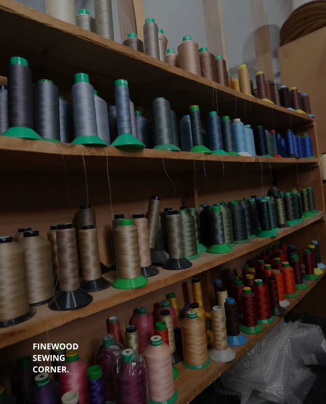 The sewing corner.

This is where covers are patterned, cut and stitched in-house, before they ever reach a frame. Doing it under our own roof means we control the fit, the seam lines and the finish on every piece &mdash; and it&rsquo;s part of why a
