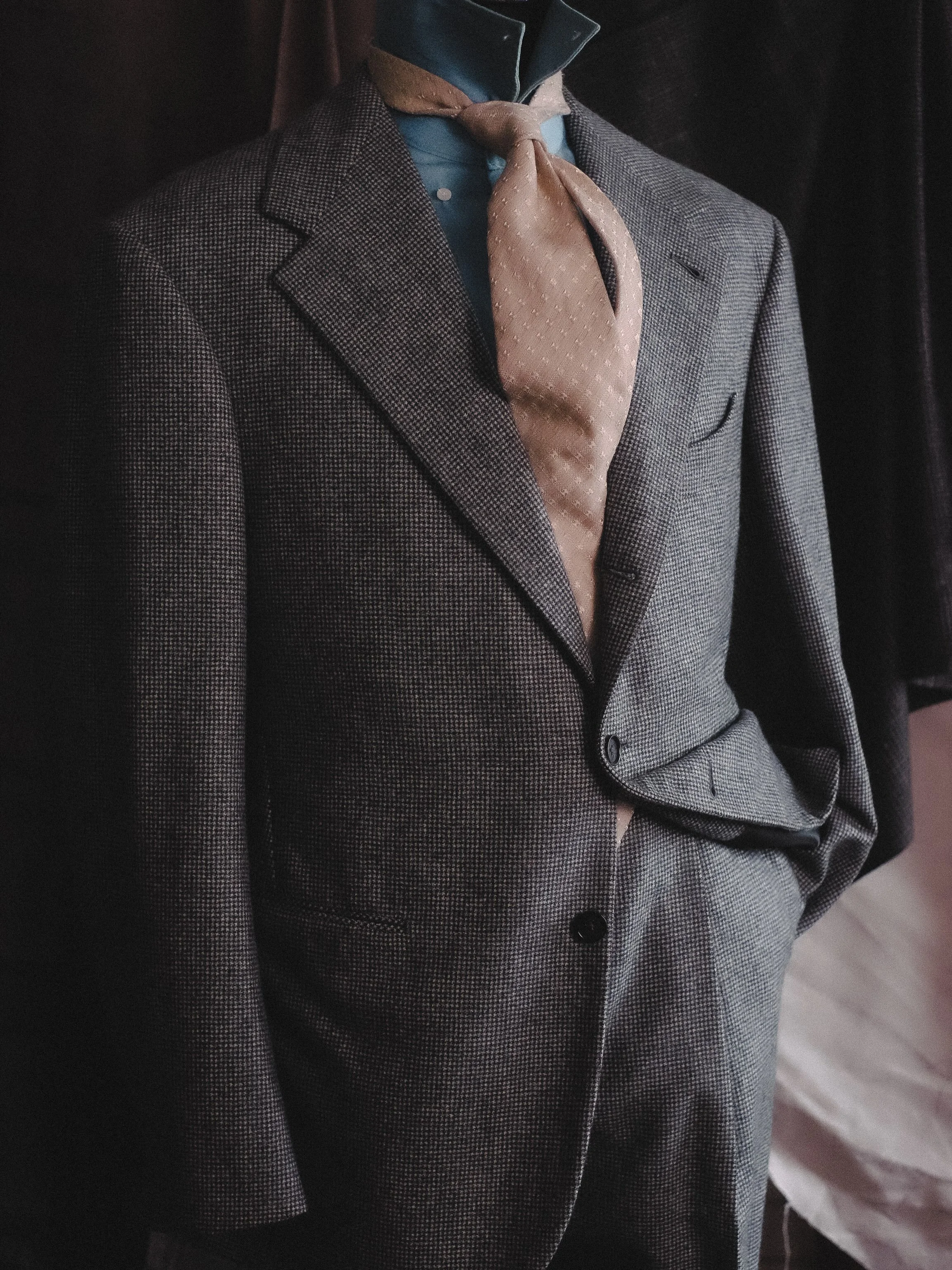 Some clothes remind us that getting dressed is more than just looking the part.

A textured jacket, a well-chosen tie, and a subtle pop of color that brings the whole look together. Nothing too loud, just enough to make it personal. The details may b