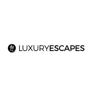 Logo for Luxury Escapes featuring the words 'Luxury Escapes' with a circular icon containing the letters 'Le' to the left of the text.