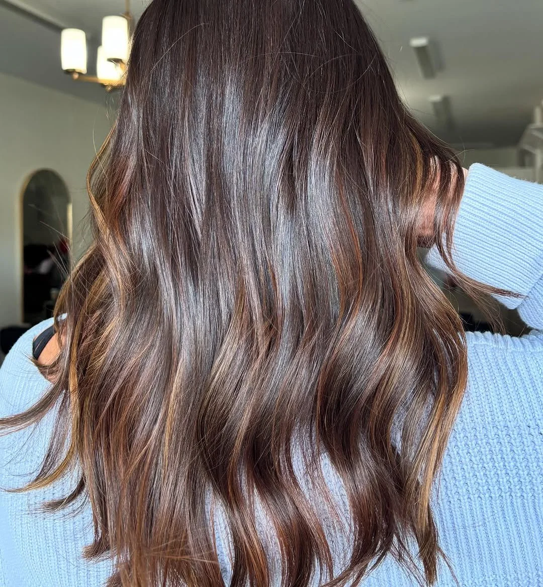 Glossy brunette hair after colour service at Thistle & Co