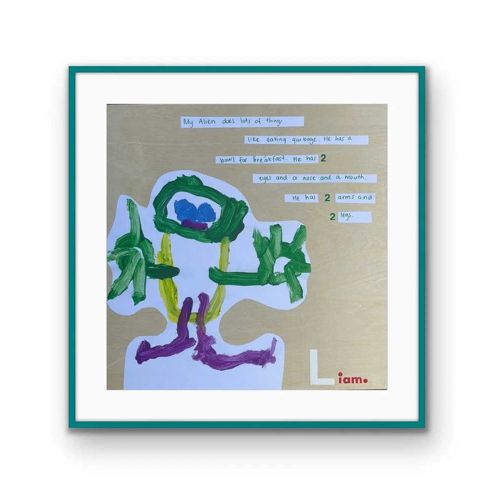 Child's colorful drawing of an alien with text describing its features and hobbies, with a framed border.