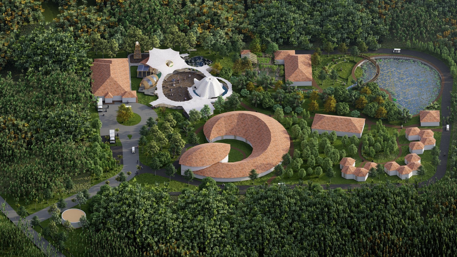 Aerial view of a large outdoor event space surrounded by trees, featuring a circular stage with a tent covering, a pond, and multiple small buildings with red-tile roofs.