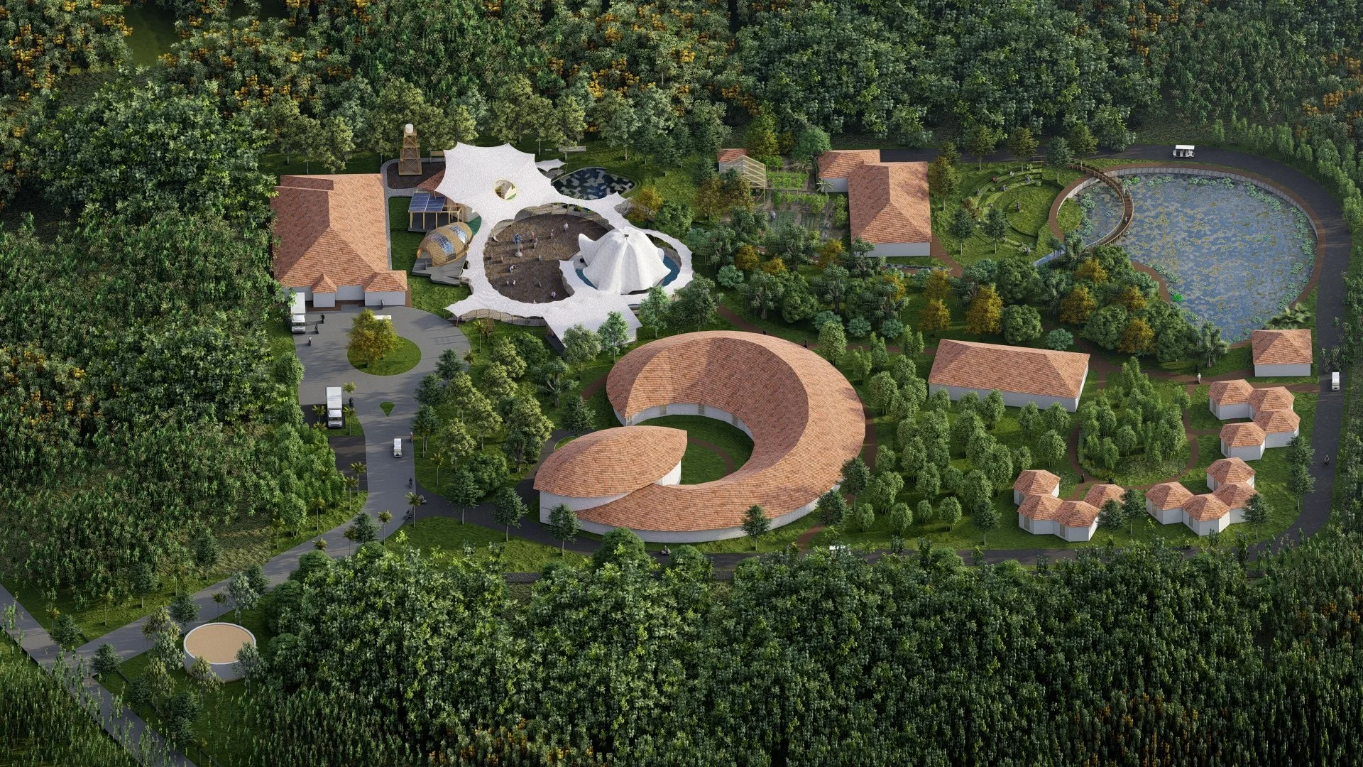 Aerial view of a park area with circular and curved buildings, a large pond, walking paths, and surrounding greenery.