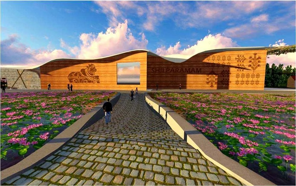 A modern building with a wooden exterior, decorative carvings, and a large glass window, surrounded by a path and flowerbeds filled with pink water lilies, under a partly cloudy sky.
