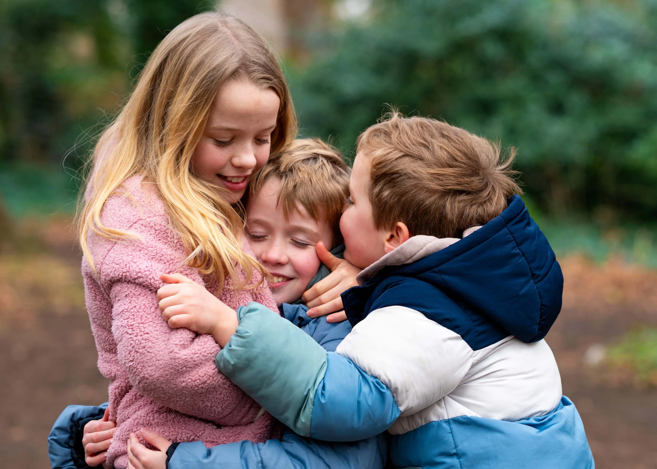 Portrait of three siblings at an outdoor photoshoot in Dublin