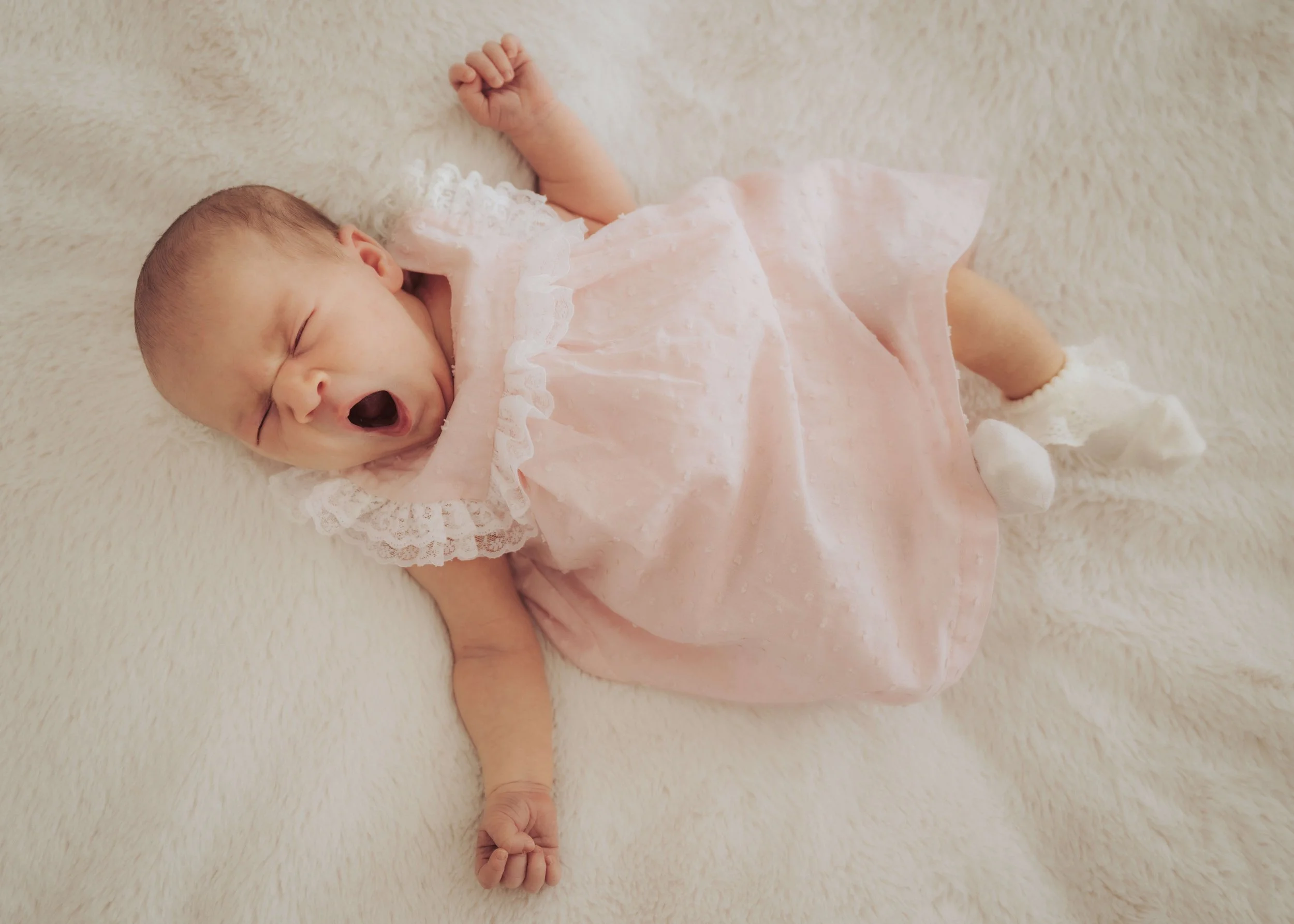 Newborn-photography-meath-newborn-yawning-portrait.jpg