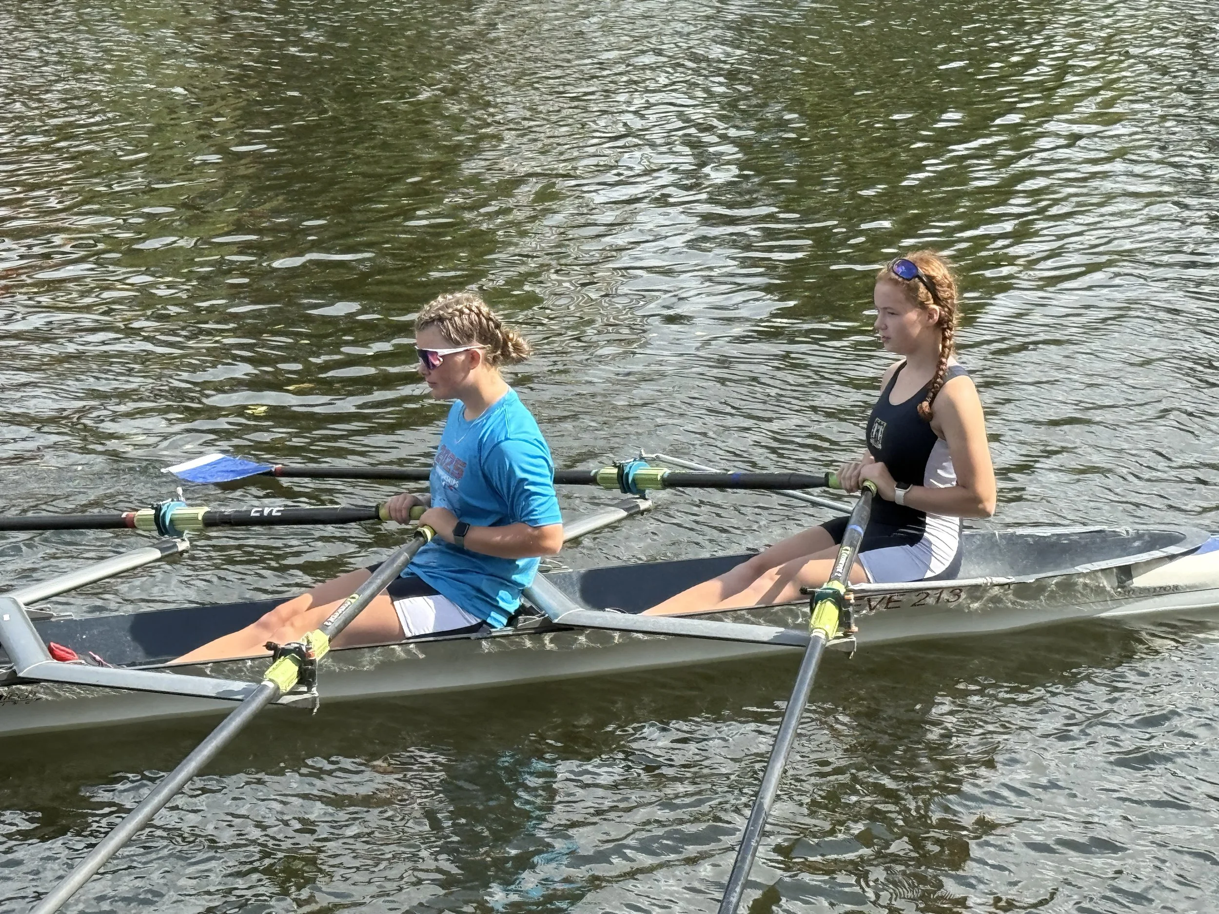 A pair of Evesham J16s head out for the start of their race.