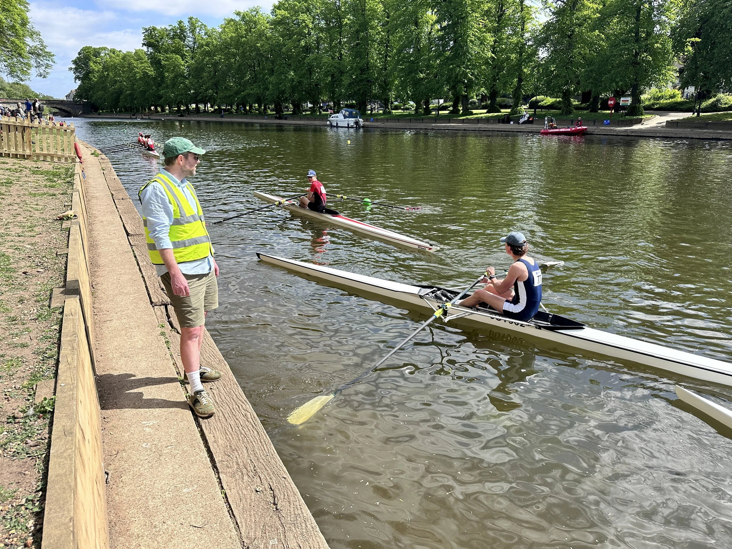 An official gives one of the club's singles some last-minute encouragement.