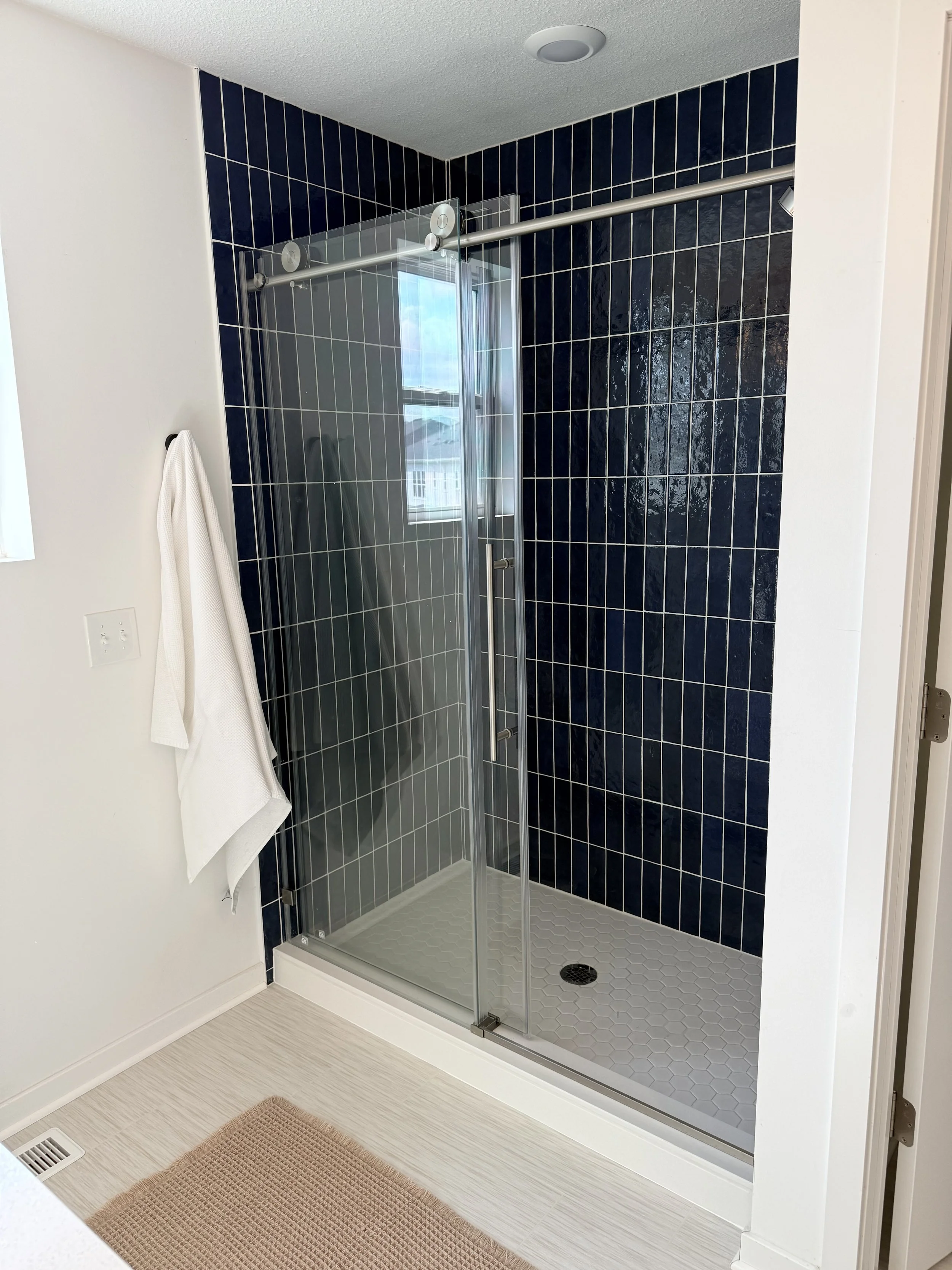 This all white bathroom was begging for some color! 