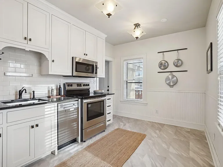 Lightening up the floors and walls made a huge impact to this space.