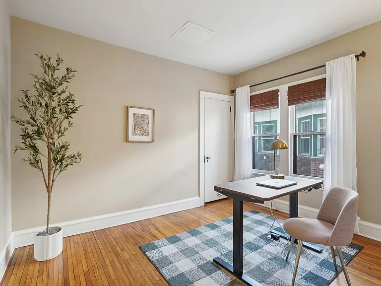 Fun fact: I did all of the staging myself for this home. Some new curtains and intentional decor made all the difference for this home office.