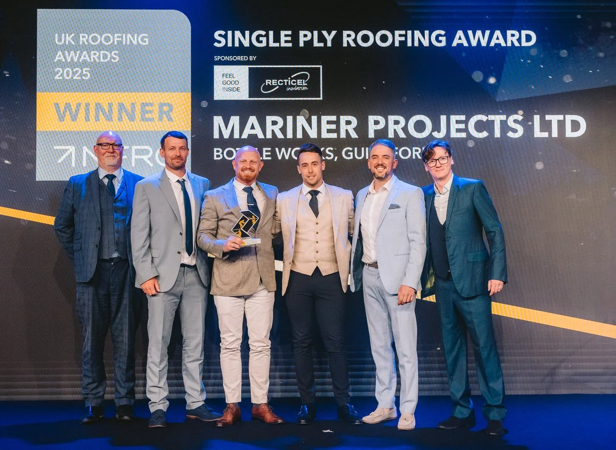 image of J&R staff receiving nfrc award for single ply roof