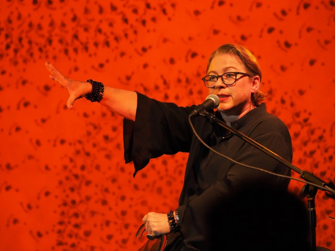 Gill on stage Red.jpg