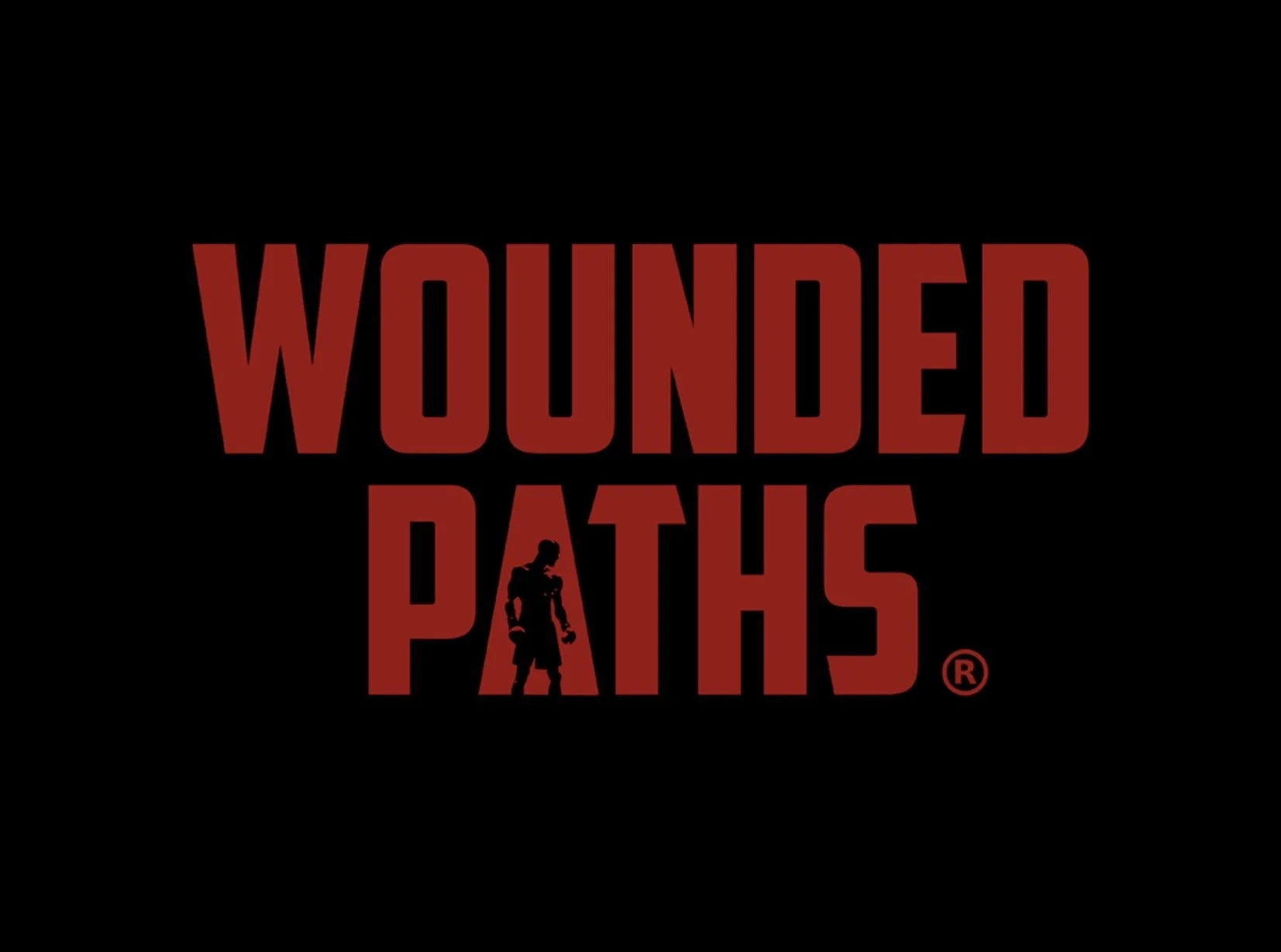 The title screen of the video game 'Wounded Paths' with bold red and black text and a silhouette of a soldier.