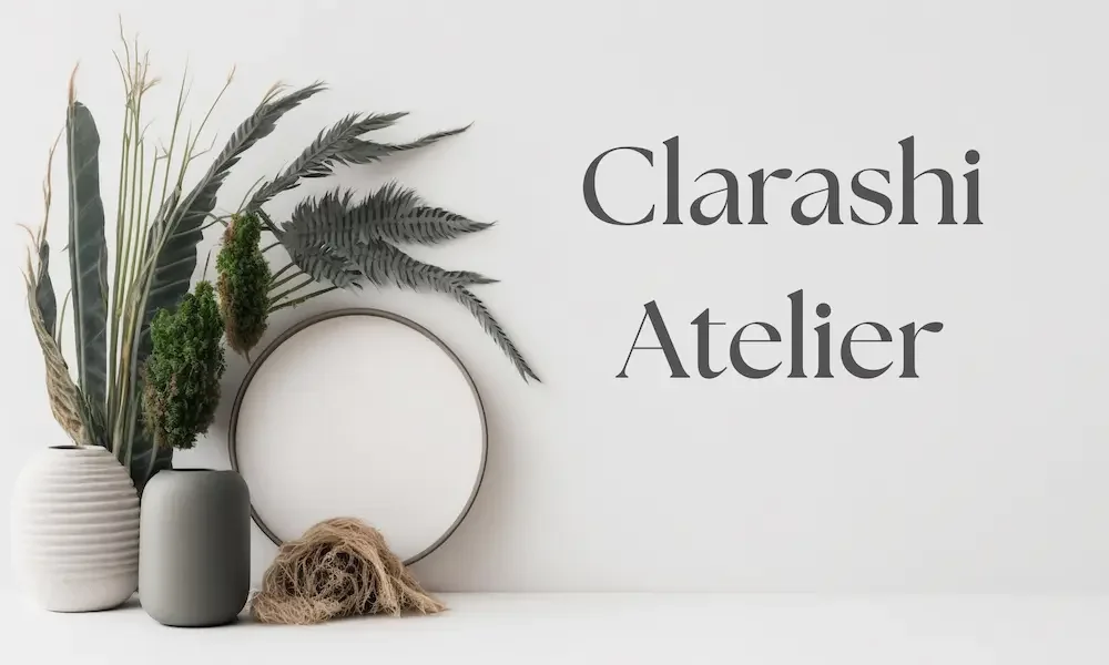 Sculptural botanicals and textured vases arranged against a soft grey wall, representing Clarashi Atelier, a six-month integrative therapeutic and coaching programme for professionals seeking deep, sustained change.