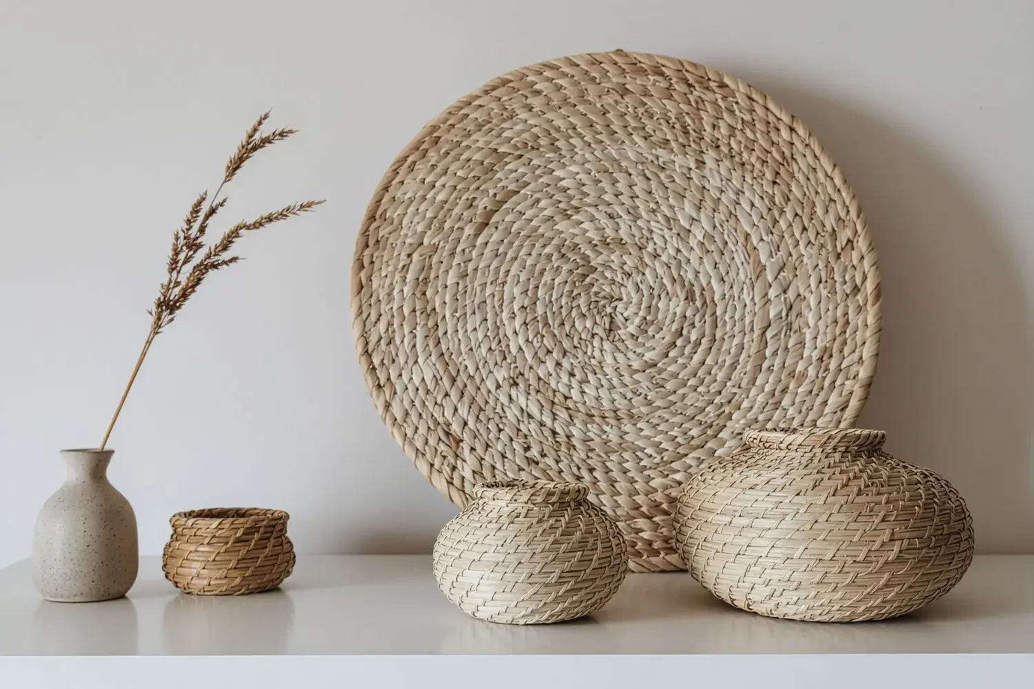Decorative woven baskets symbolising balance and calm, representing the quietly challenging and focused therapeutic space for professionals.