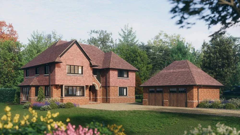 A large brick house with a separate garage building, surrounded by green trees and a well-maintained lawn.