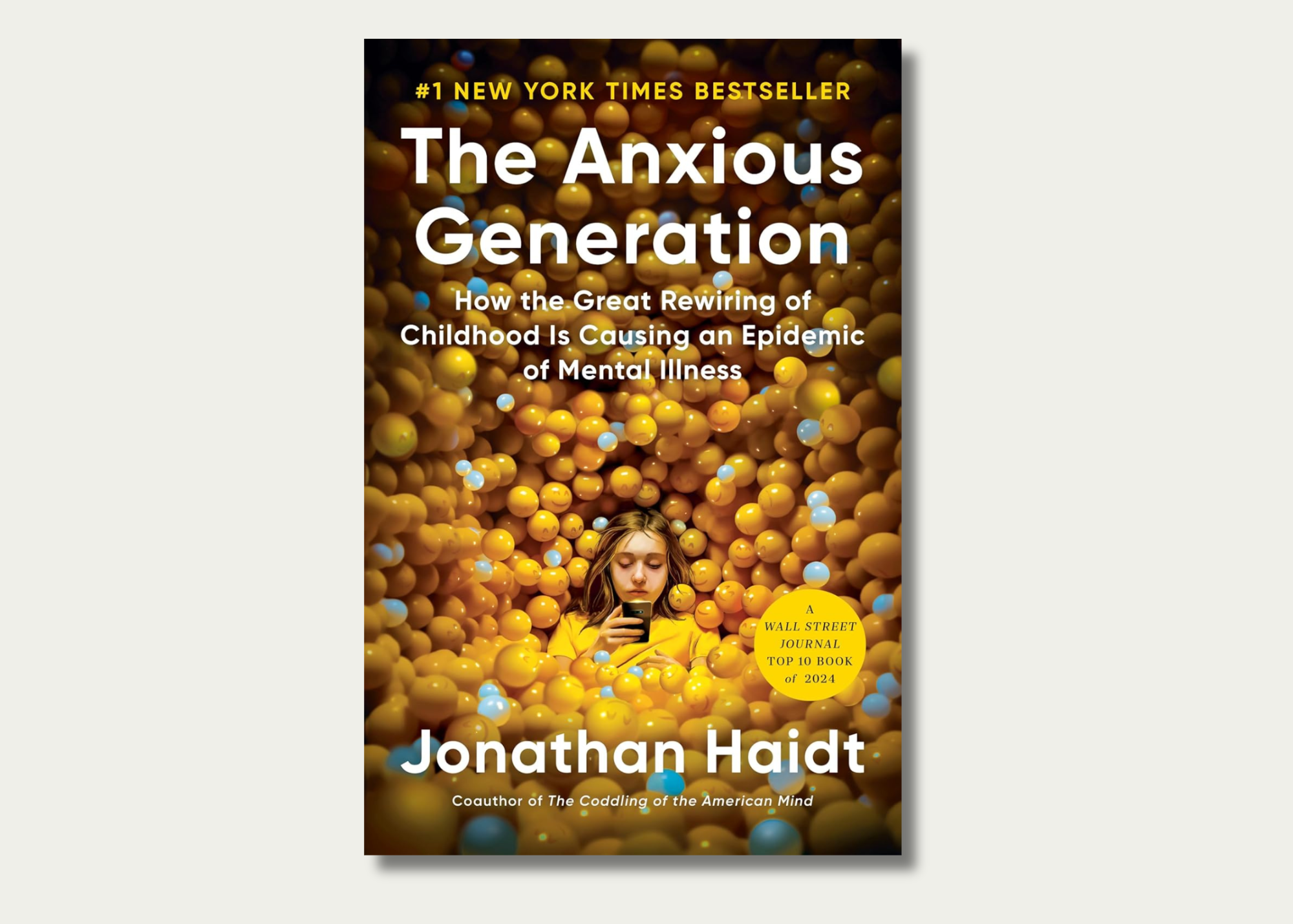 The book cover for "The Anxious Generation" by Jonathan Haidt features a young girl looking at her phone amidst a background of yellow, orange, and blue plastic balls. The title and subtitle are prominently displayed in white and yellow text, with a 