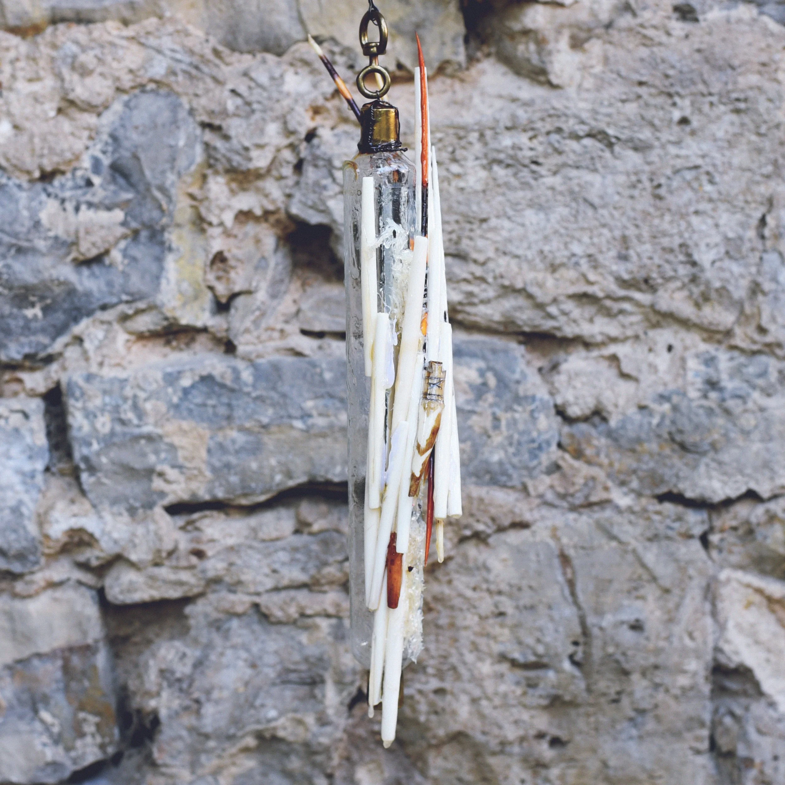 Fingernails, porcupine spikes and beads made from bone. 