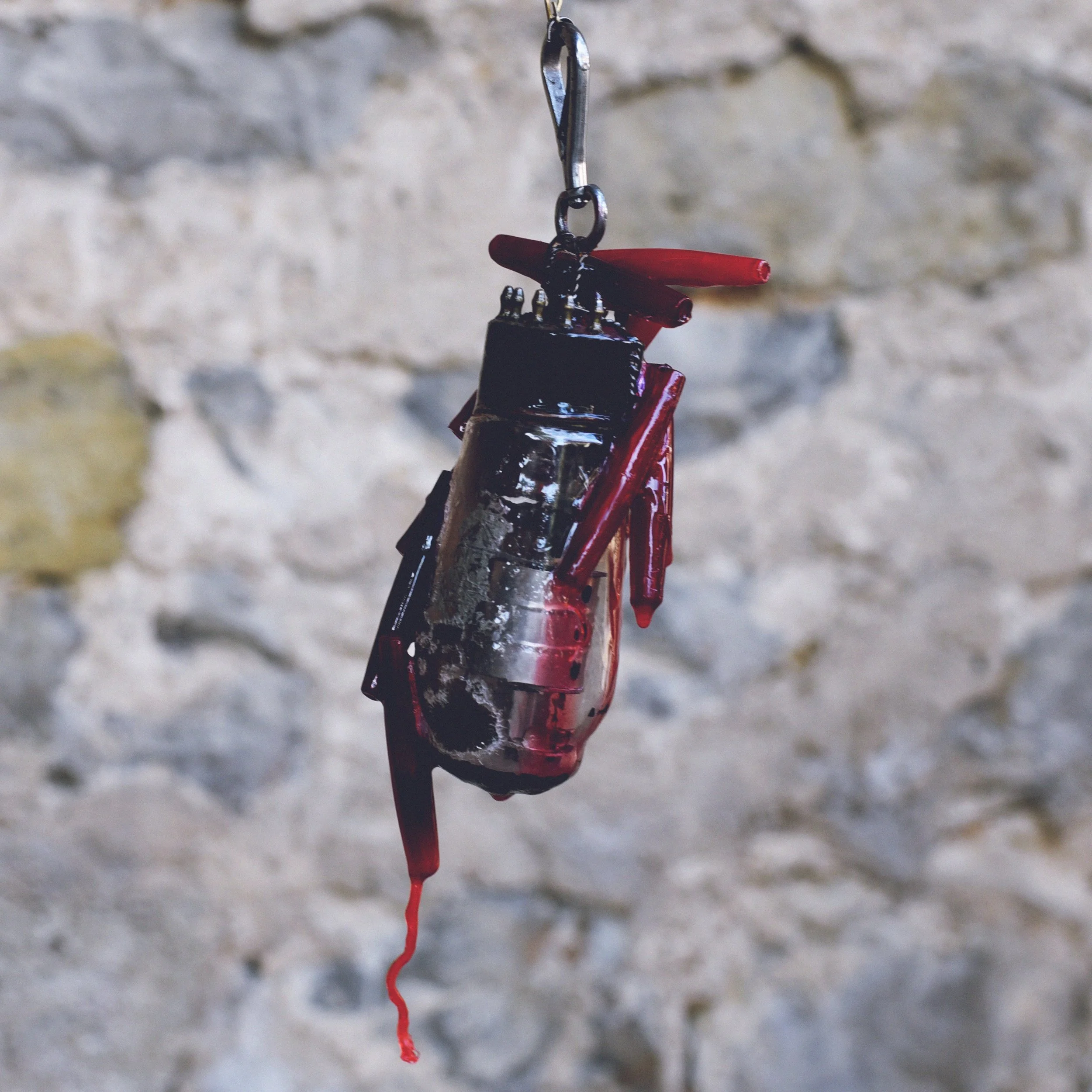 Red dyed beads made of bone. 