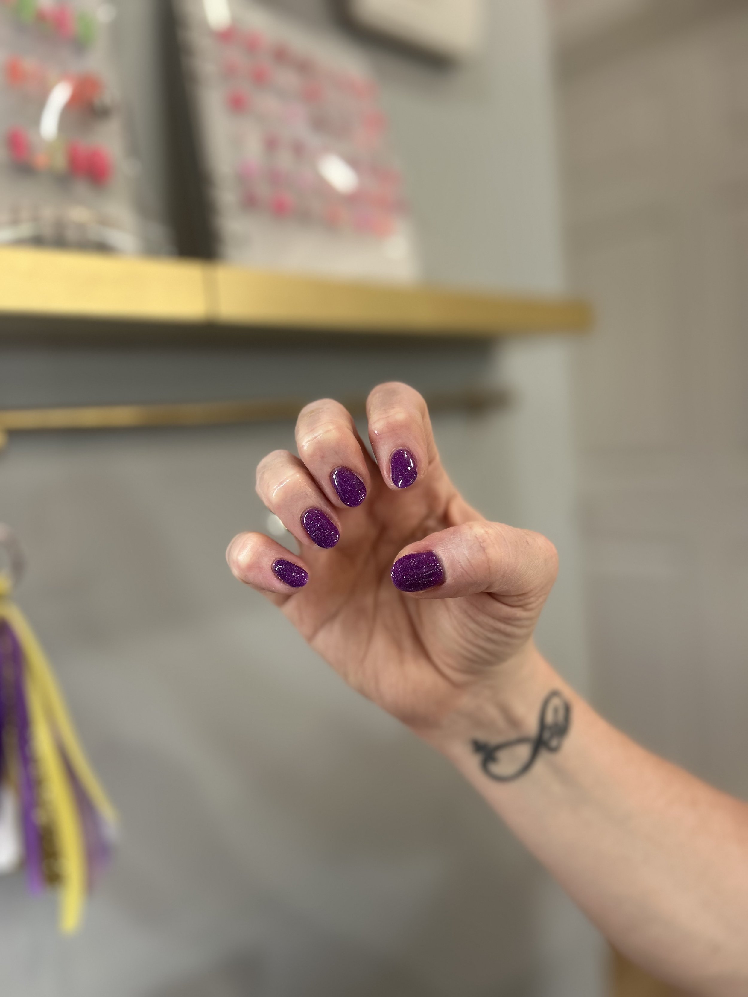 purple gilter nails.jpeg