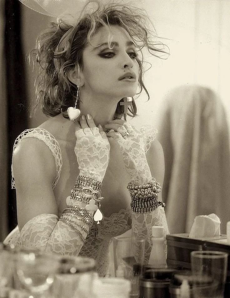 Madonna wearing layered necklaces and bracelets 1980s — bold jewelry inspiration The Rebel Age