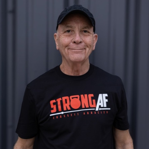 CrossFit Coach Michael Moore who taught Jeannie Ward that strength training was longevity