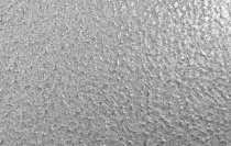 Close-up of a textured, metallic gray surface